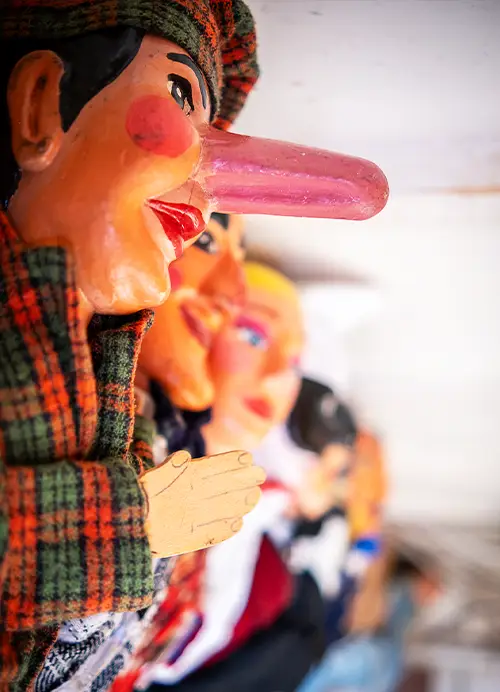 Close-up detail of the Mercurio family handcrafted puppets