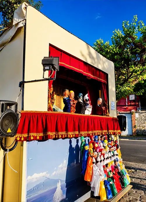 Corner of the Mercurio Puppet Theatre set up in the town square