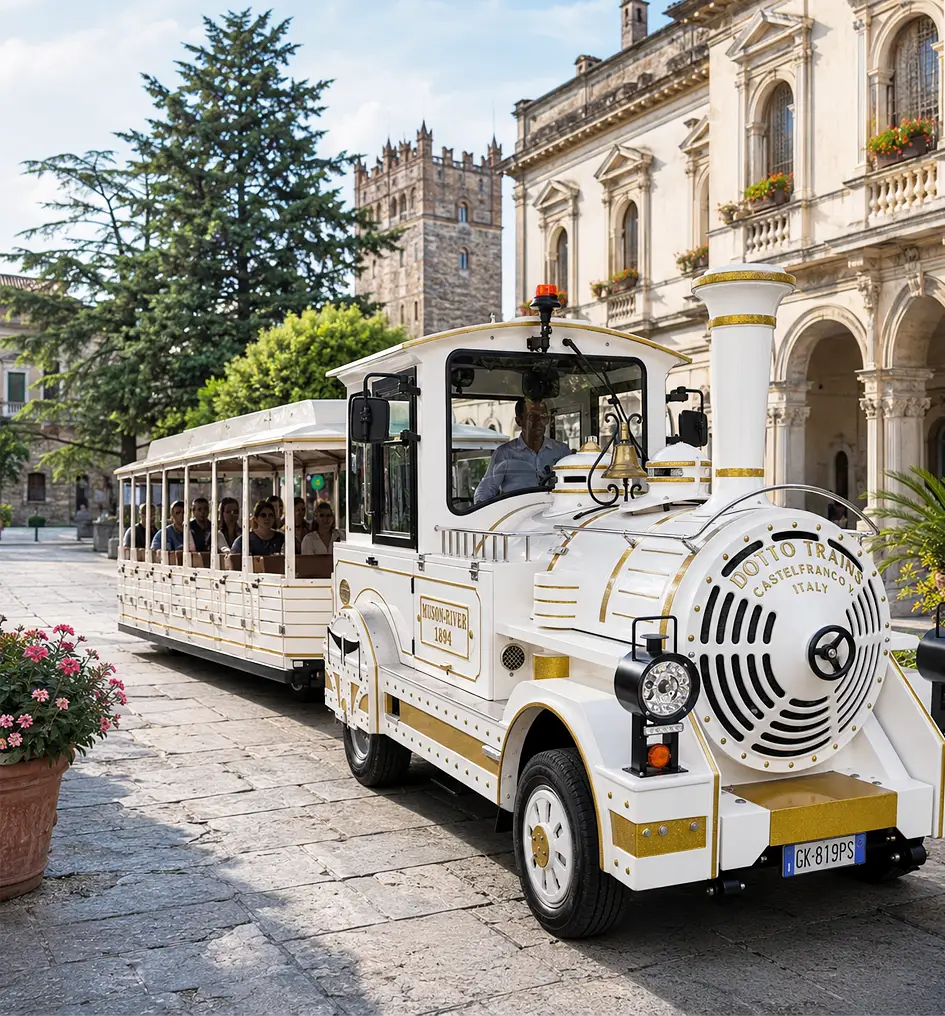 The Mercurio Train during a scenic tour through a historic town centre